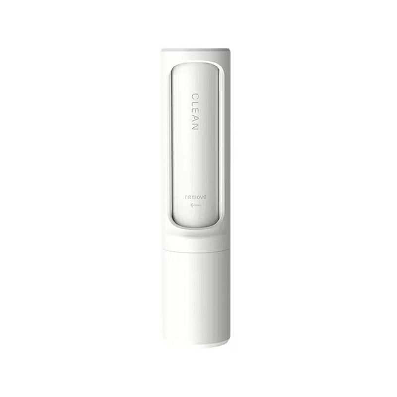 Reusable pet hair remover roller on white background
